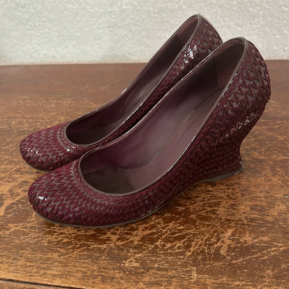 Bottega Veneta burgundy wedge heels.  Patent leather with embroidery chevron.